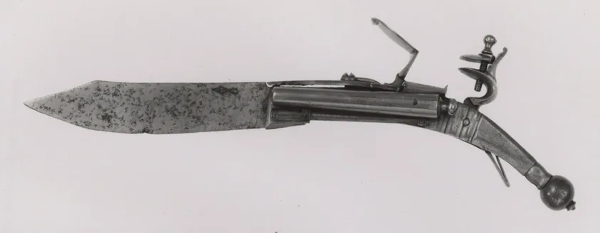 Un cuchillo plegable combinado con una pistola de chispa de doble cañón, metal ricamente decorado