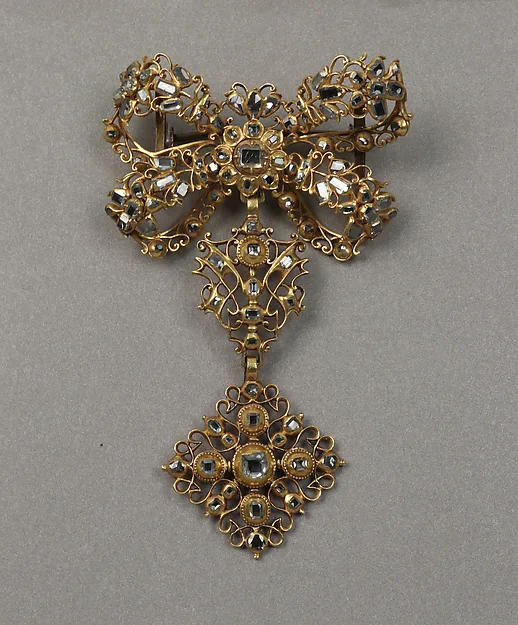 Broche antiguo con piedras
