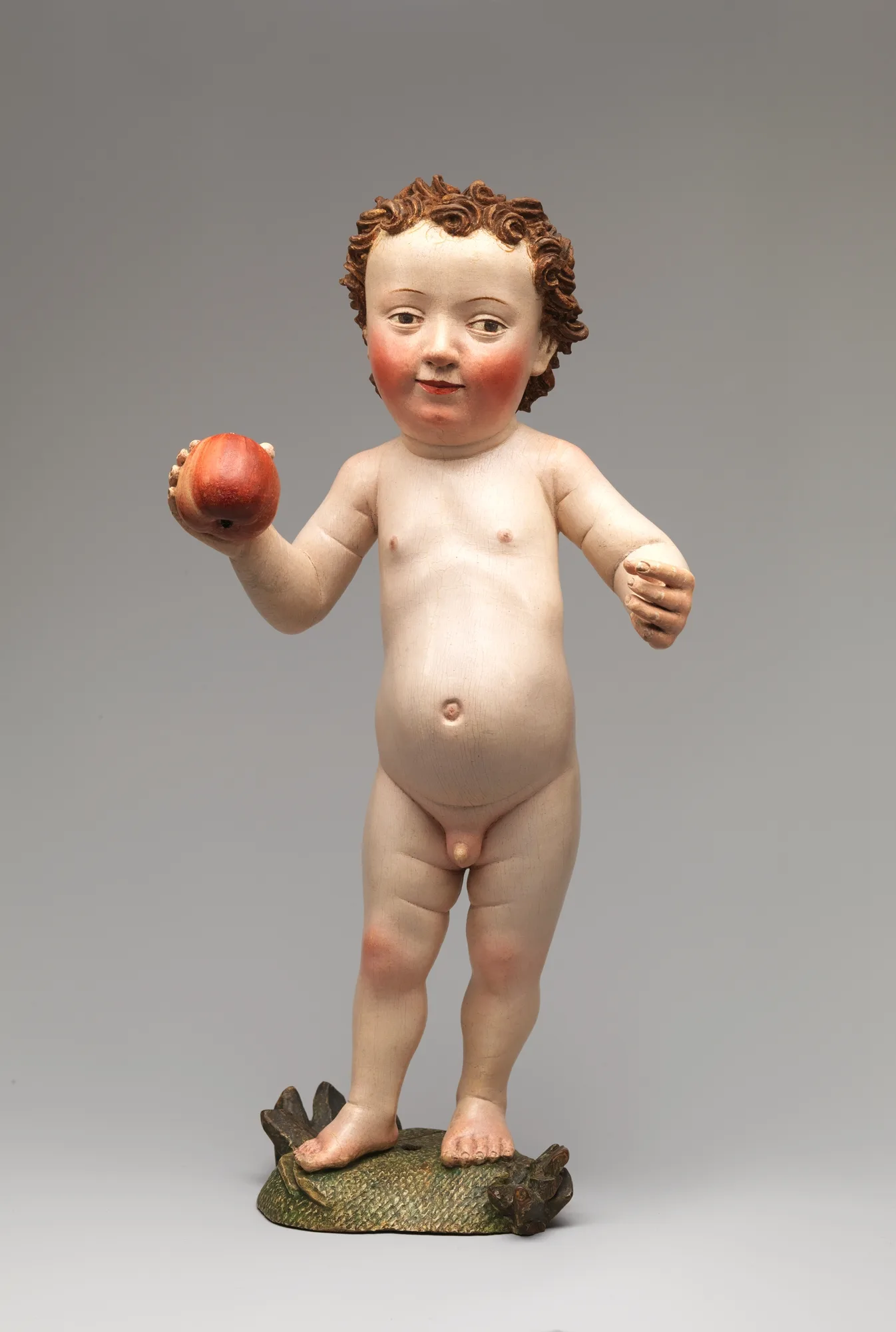 Figura de madera del Niño Jesús con una manzana, siglo XV