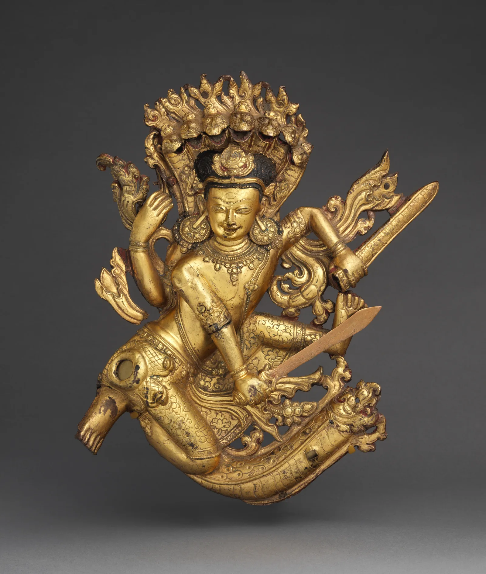 Krishna en joyería: dios del amor, flauta, pluma de pavo real y Radha