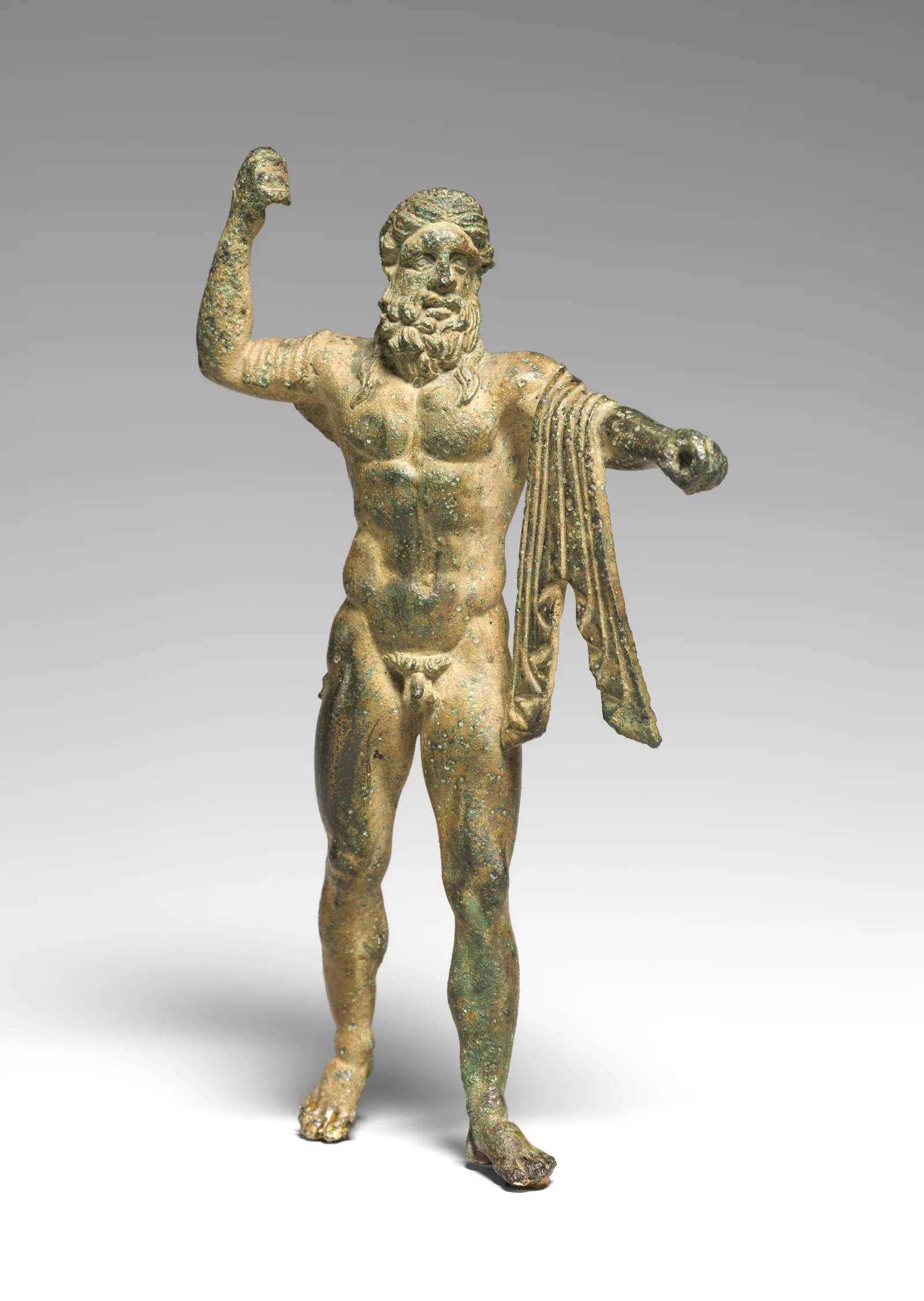 Estatuilla romana de bronce de Neptuno con el tridente, principios del siglo I d. C.