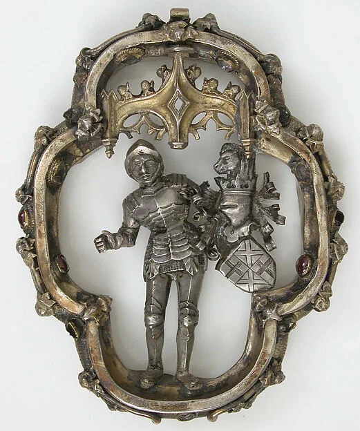 Colgante con forma de escudo heráldico