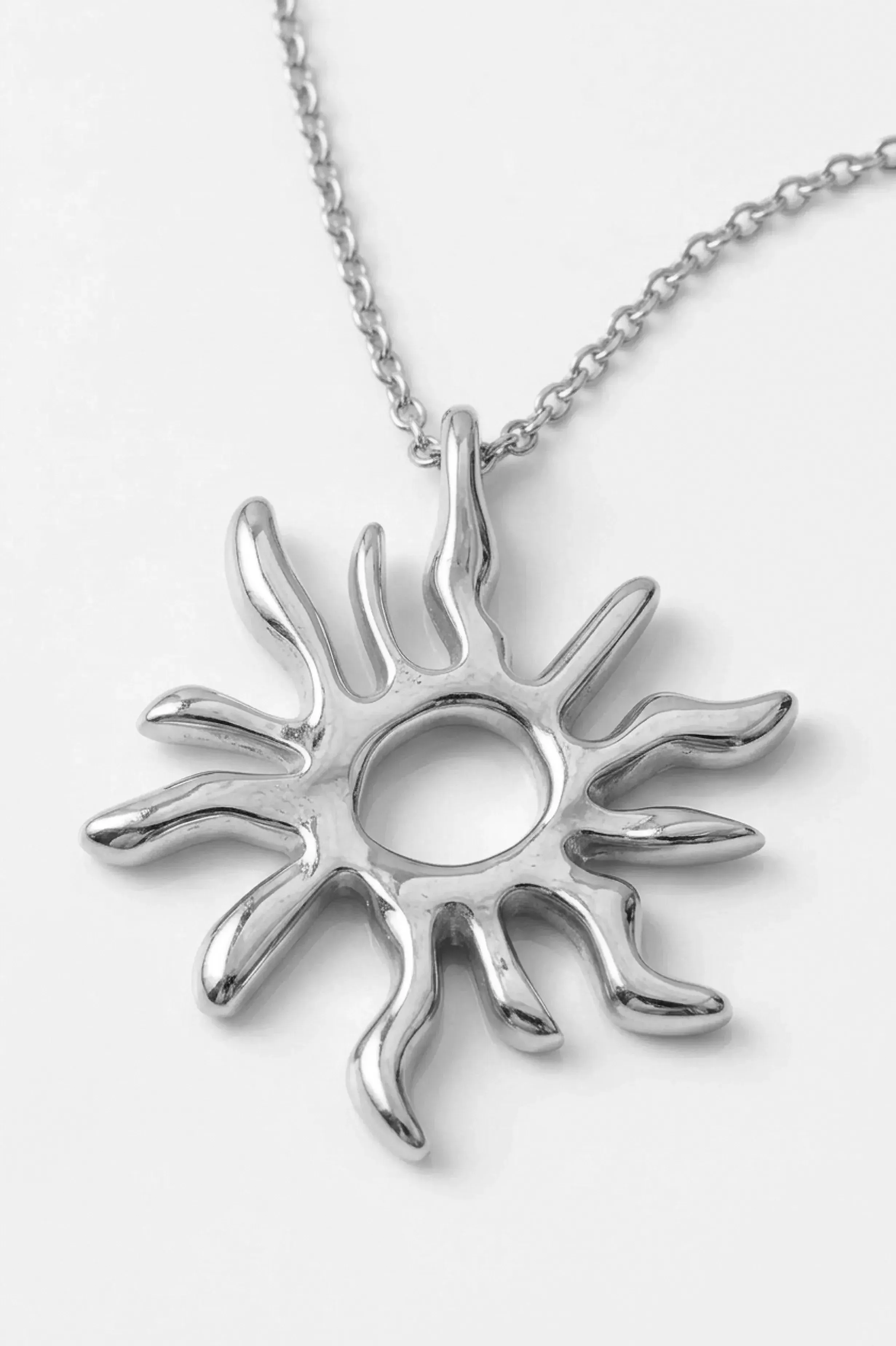 RADIANT SUN PENDANT SILVER-TONE